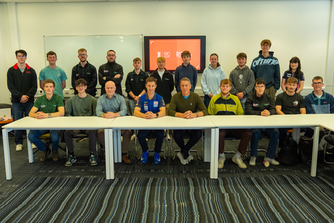 Jonathan Rea pictured with a group of students at Queen's University Belfast